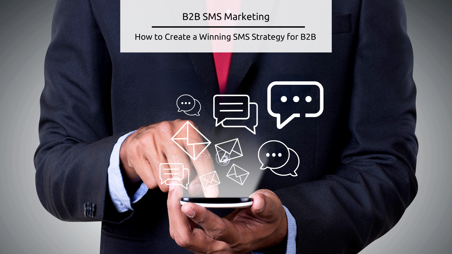 Stock feature image - B2B SMS Marketing - Image shows a man in a suit looking at his cellphone